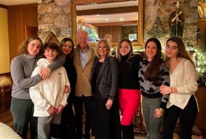 Image of Joe Biden with his wife and multiple, younger female family members. His son Hunter Biden is absent.